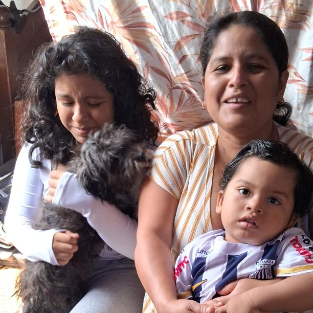 Aurora and her children in Chiclayo, Peru